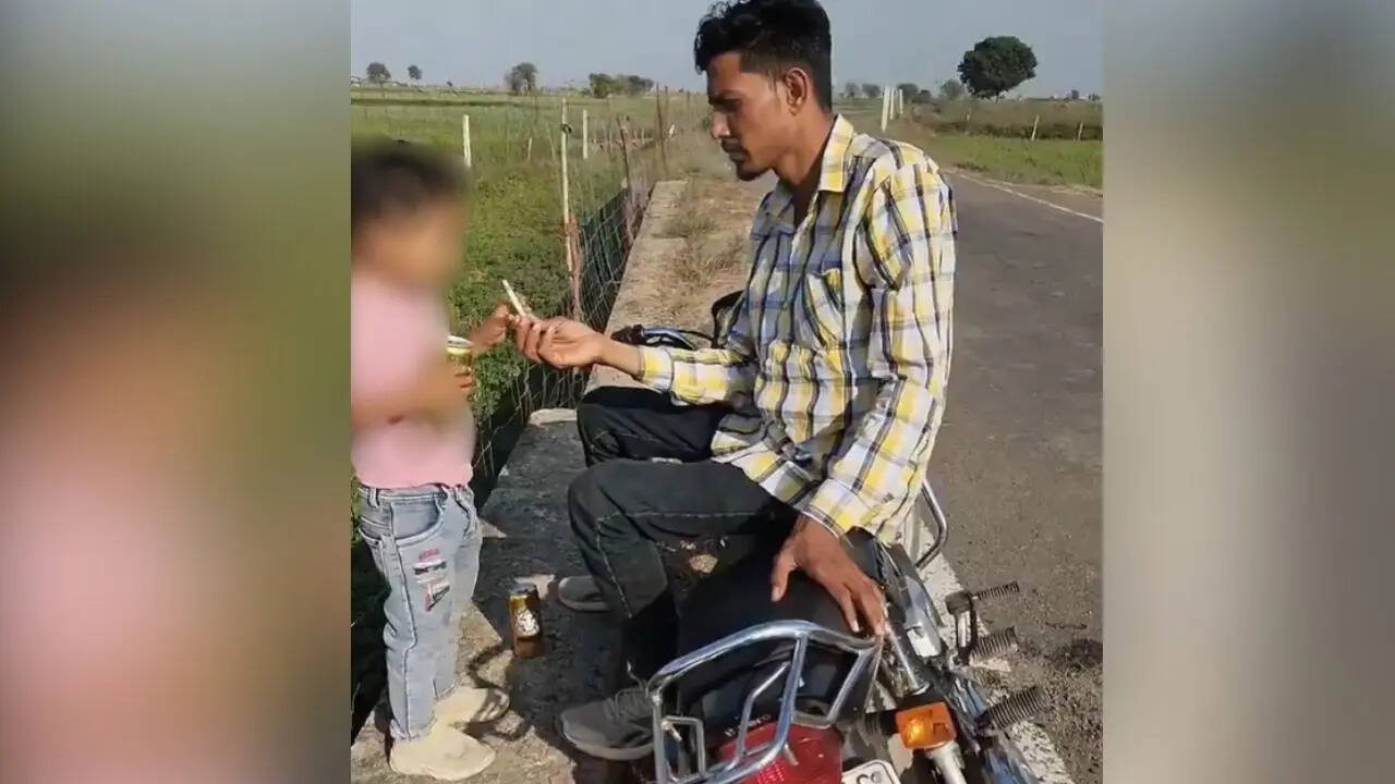 Man Seen Giving Cigarette & Beer To Small Child In Viral Video, Sparks Outrage